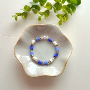 Purple and White Bracelet with Gold Star Accents